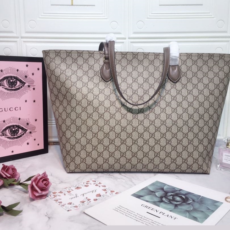 G*u*i shopping bags